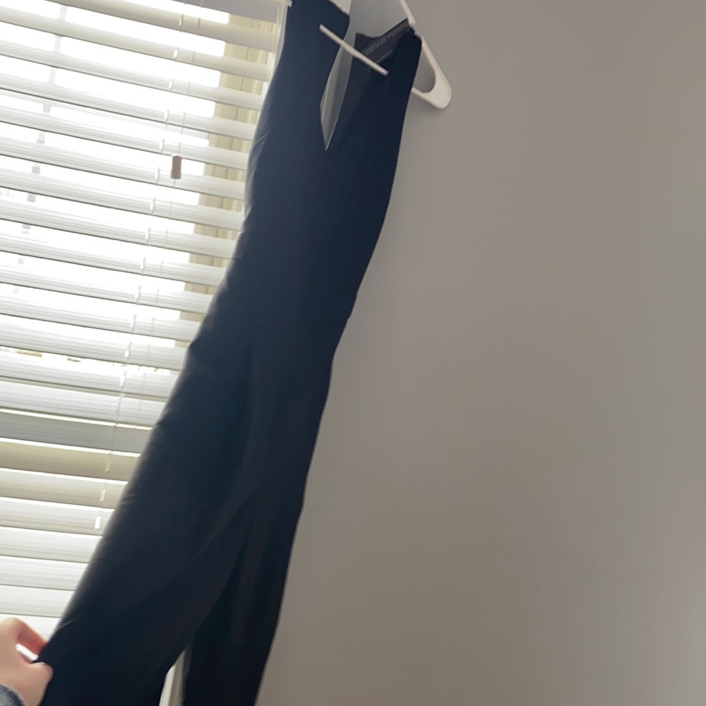 Black v neck tank jump suit with tie back